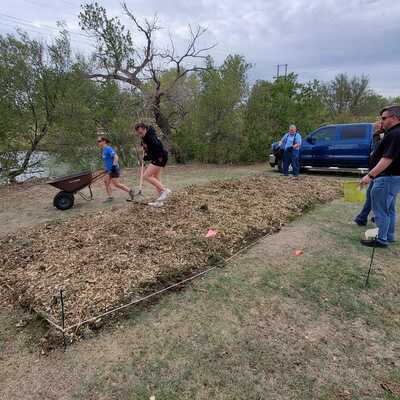 Building a lasgna bed at the Victory Garden of Barton County peoples garden initiative.